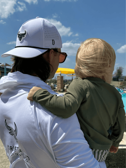 Father and son enjoying a day at the pool